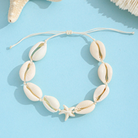 Cheville ajustable faite à la main avec coquillages cauris, perles et breloque étoile de mer – Cadeau de plage