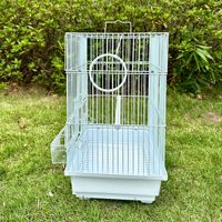 Factory Direct 2000 en stock Cage à oiseaux canari en métal ornemental en fer avec motif solide et fermeture à bouton-pression
