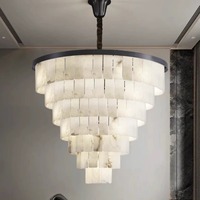 Lustre moderne de luxe en marbre espagnol Lampe design simple et créative pour le salon