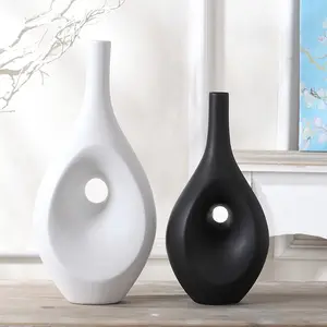 Florero de porcelana de cerámica geométrica, florero de estilo nórdico moderno blanco y negro para decoración del hogar y boda, venta al por mayor de fábrica