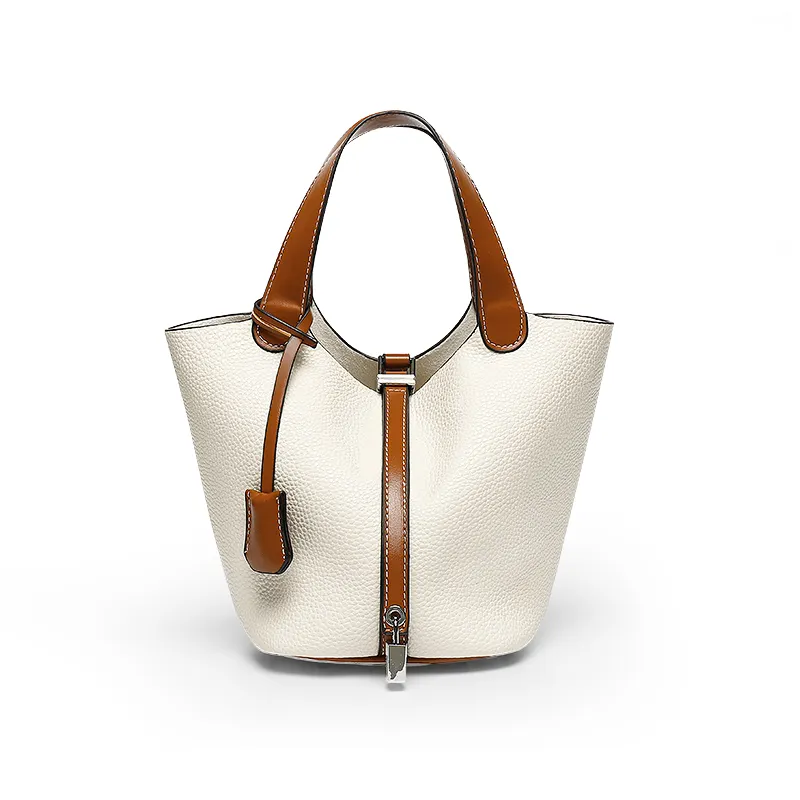TAOMICMIC fashion niche design basket women's handbag simple color bump shoulder bag