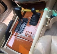 Nouveau pour Toyota Land Cruiser LC100 LX470 : Boîte de rangement pour l'espace entre les sièges, console centrale adaptable 4500 4700