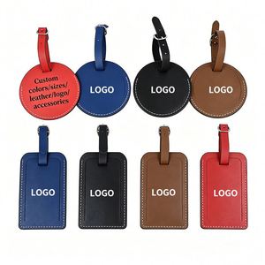 Étiquette de bagage ronde de luxe, haute qualité, durable, portable, en PU texturé, personnalisable avec lettre, gris - Product Image 1