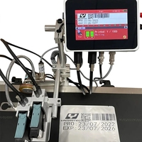 YAOMATEC Imprimante à jet d'encre automatique en ligne avec impression de date d'expiration de bouteille industrielle de 50.8mm pour l'impression de numéros de lot