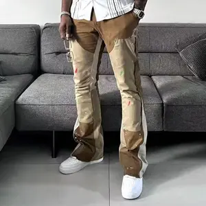 Streetwear personnalisé OEM Pantalon évasé à patchwork d'éclaboussures de peinture sur jambes larges avec ourlet brut pour hommes