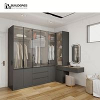 Système de dressing d'angle en bois en forme de L moderne avec portes coulissantes, design modulaire et coiffeuse intégrée