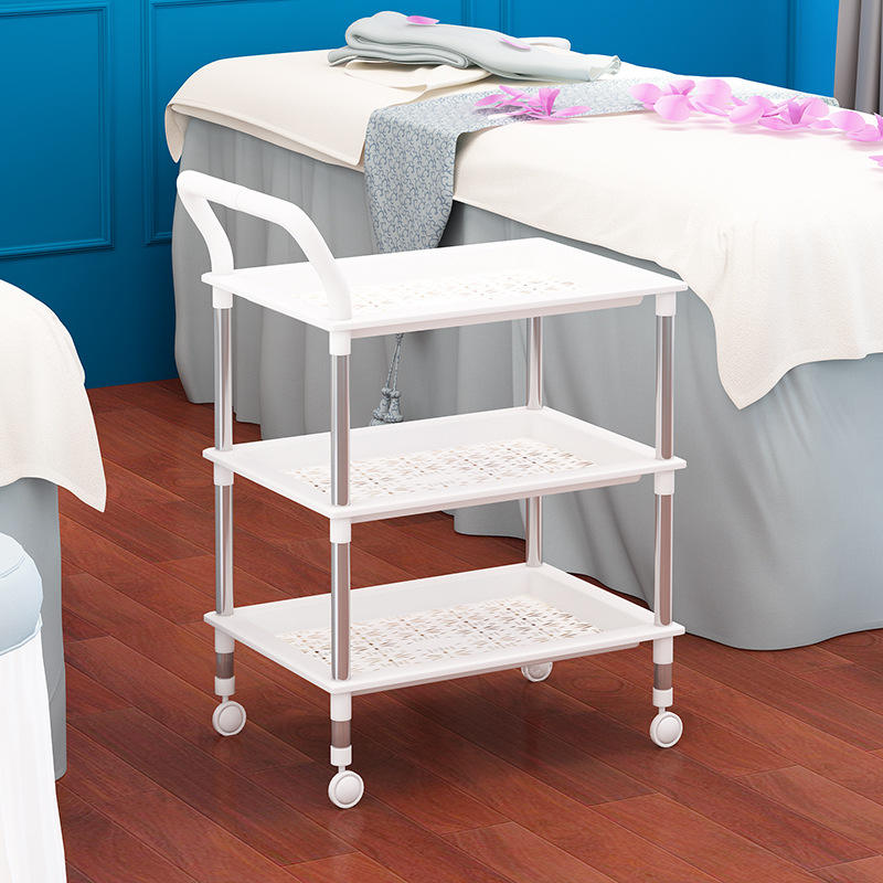 White three-tiered trolley with stainless steel pillars