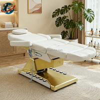 Mobilier de salon de beauté pour esthéticiennes : Lit facial incurvé à base dorée, mécanisme de levage électrique, table de massage à 4 moteurs, lits de luxe pour extensions de cils