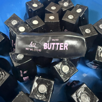 Boule anti-stress noire en forme de bâton de beurre, faite à la main, croustillante et moelleuse, jouet de Noël artisanal