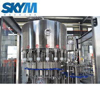 Haute vitesse entièrement automatique Monobloc Piston Pet petite bouteille tournesol moutarde sésame noix de coco huile comestible Machine de remplissage
