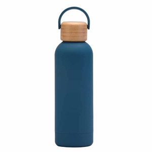 Nouvelle Bouteille d'Eau Isotherme en Acier Inoxydable 304 de 750 ml avec Couvercle en Bois de Bambou, Isolation Thermique 6-12 Heures, Design Minimaliste 2026 - Product Image 5