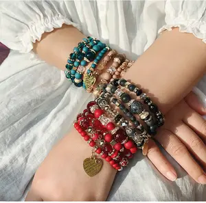 Kunden spezifische Damen böhmischen mehr schicht igen Perlen Herz Charme hand gefertigten elastischen Armband Schmuck