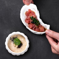 Vaisselle en céramique blanche de haute qualité en gros assiette irrégulière en céramique bols d'huîtres d'oursins pour restaurant