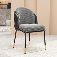 Chaise de salle à manger de luxe en pierre à motif pied-de-poule avec pieds en métal doré en forme d'arachide pour usage en restaurant