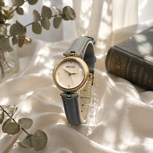 Montre-bracelet élégante pour femme, fine et ronde, avec lunette pavée de cristaux dorés, cadran en nacre, bracelet en cuir véritable, étanche - Product Image 1