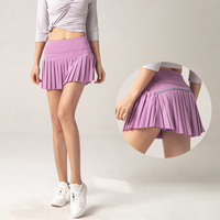 Culottes respirantes taille haute à séchage rapide pour femmes Shorts de gymnastique Jupes plissées de poche pour les sports d'été Fitness Yoga Leggings