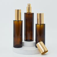 Bouchon noir Anti-UV flacon en verre ambré parfum huile essentielle bouchon en aluminium vaporisateur bouteille ronde longue et fine avec pompe à Lotion