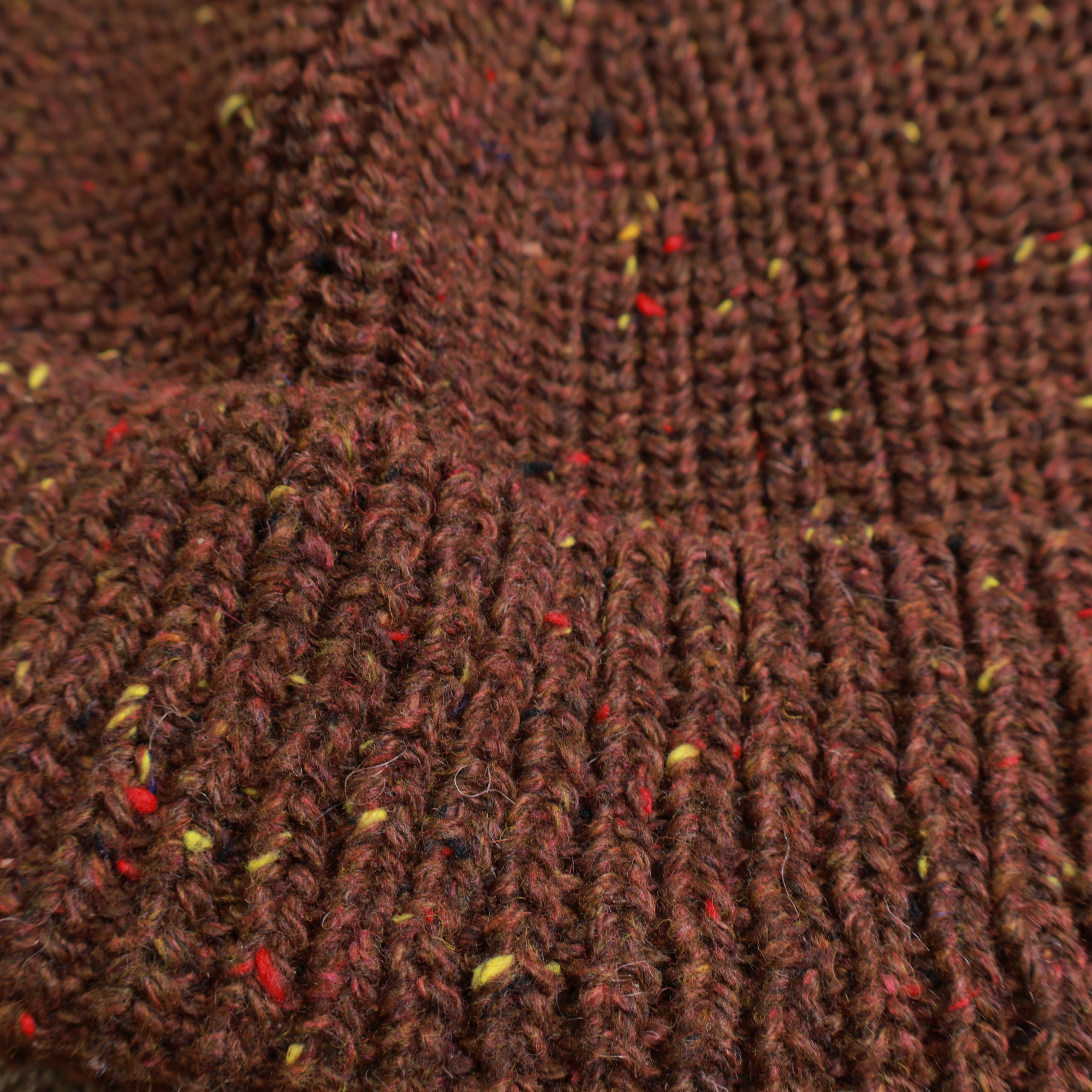 Tie-dye pattern detail of knitted beanie