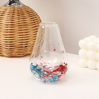 Vente chaude Tasse en verre à double paroi en borosilicate de haute qualité Design simple de fleurs séchées Résistante à la chaleur Tasse à café pour la maison Boisson au lait