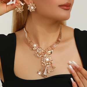 European and American Explosions Golden Zinc Alloy V-Shaped <b>Flower</b> Necklace Earrings Set Female 2025 Spring - Product Image 1