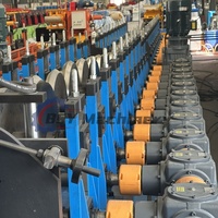 Machine de formage à froid entièrement automatique pour la production en usine de profilés d'angle de colonnes de construction en acier à grande vitesse