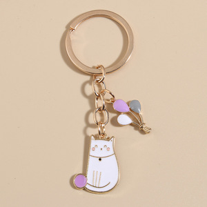Llavero de aleación de zinc esmaltado con diseño de gato blanco lindo y dije de pata, colgante de moda de forma irregular, adorno ligero para bolso - Product Image 6