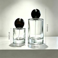 Emballage de parfum en verre de forme ronde standard haut de gamme 30 ml 50 ml 100 ml