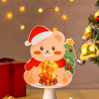 Décoration de Noël Lanterne Père Noël Lumineuse en Forme de Tête, Boîte en Carton Pomme avec Poignée en Fil Métallique, Décoration de Table pour les Fêtes