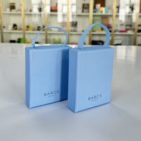 Emballages de bijoux écologiques personnalisés, boîtes cadeaux pour colliers et boucles d'oreilles avec poignée, laminage mat, gaufrage, papier artistique, doublure en éponge