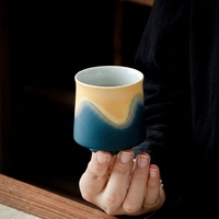 Service à thé en céramique créative et artistique, tasses et soucoupes, quatre couleurs, effet four, style chinois, design vintage de luxe léger avec poignée