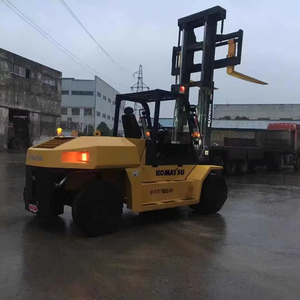 Large Load Used Komatsu FD100 Diesel Forklift with Three Stage Mast for Improved Efficiency in <b>Material</b> <b>Handling</b> Business - Product Image 1