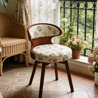 Chaise de salle à manger moderne minimaliste de style français en bois massif avec dossier pivotant, pieds en hêtre et revêtement en tissu pour la salle à manger à domicile
