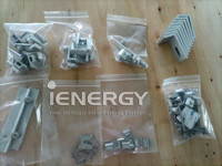 Kit de fixation pour panneaux solaires en forme de L, comprenant un kit de fixation intermédiaire, un kit de fixation d'extrémité, un connecteur de rail et un rail pour toit trapézoïdal