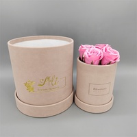 Boîtes à fleurs et à roses de luxe de forme ronde en matériaux recyclés avec couvercles, laminage mat et gaufrage