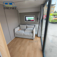 Chine personnalisé personnalisé prix raisonnable luxe portable en fibre de verre conteneur modulaire maison cosses petite maison smart apple cabin