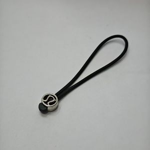 弹性橡胶设计瑜伽服，带松紧绳和皮革制成的PVC拉链拉拔器 - Product Image 1