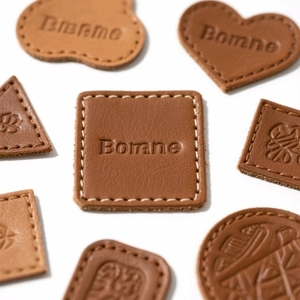 Тисненая кожаная Этикетка из искусственной кожи, этикетка для одежды для джинсов, брюк, сумок и обуви, цвет и дизайн на заказ - Product Image 1