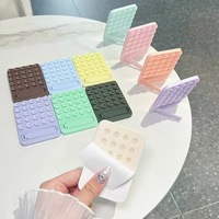 Nouveau support de téléphone multifonctionnel en silicone avec adhésif puissant et design pliable, adapté aux appareils de 4 à 7 pouces