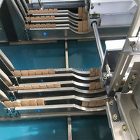 Máquina de ensamblaje de partición de cartón corrugado CGJ Ingenieros automáticos disponibles para dar servicio en línea en el extranjero