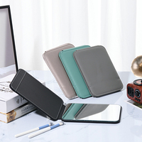 Miroir de poche pliant en cuir PU avec logo personnalisé Miroir de courtoisie de voyage portable avec support pour table de bureau Miroir de maquillage