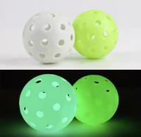 Offre d'usine : Balles de pickleball lumineuses LED en plastique phosphorescentes de 74 mm à 40 trous pour l'extérieur, 25-26 g