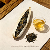 Thé blanc d'arbre ancien Meiziqing 100g, thé blanc du Yunnan naturel emballé dans des écorces de maïs, petit format pressé