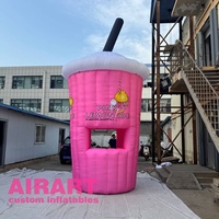 Tente gonflable en forme de mangue pour stand de jus en plein air, idéale pour la publicité et la décoration.