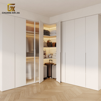 Armoire d'angle moderne en bois écologique en forme de L pour projets d'appartements et d'hôtels, mobilier de chambre personnalisé en gros