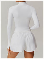 Veste de sport pour femmes grandes tailles en nylon rose pâle à col montant, coupe ajustée, extensible dans quatre directions, respirante, avec fermeture éclair, pour le yoga