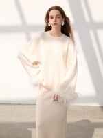 Pull en cachemire pour femme, col rond, manches ballon, tricot épais, coupe oversize, avec bordure en plumes, haut minimaliste de luxe pour l'hiver