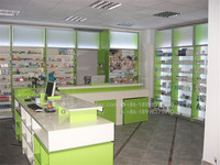 Conception de comptoir de magasin médical meubles de bureau d'affichage Table de caissier de magasin de santé naturelle à vendre comptoir de réception de pharmacie moderne