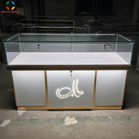 Ensemble de présentoirs à bijoux en gros avec vitrines éclairées par LED et comptoirs de rangement pour les magasins de centres commerciaux - Système d'affichage personnalisable et écologique