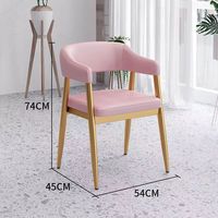 Fauteuil élégant rembourré en similicuir vert menthe avec cadre en métal doré, coussin de siège moelleux, dossier incurvé pour les espaces de café