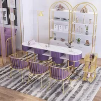 La couleur et la taille de la table de manucure en marbre velours rose de luxe peuvent être personnalisées ensembles de tables et de chaises pour ongles de meubles de beauté